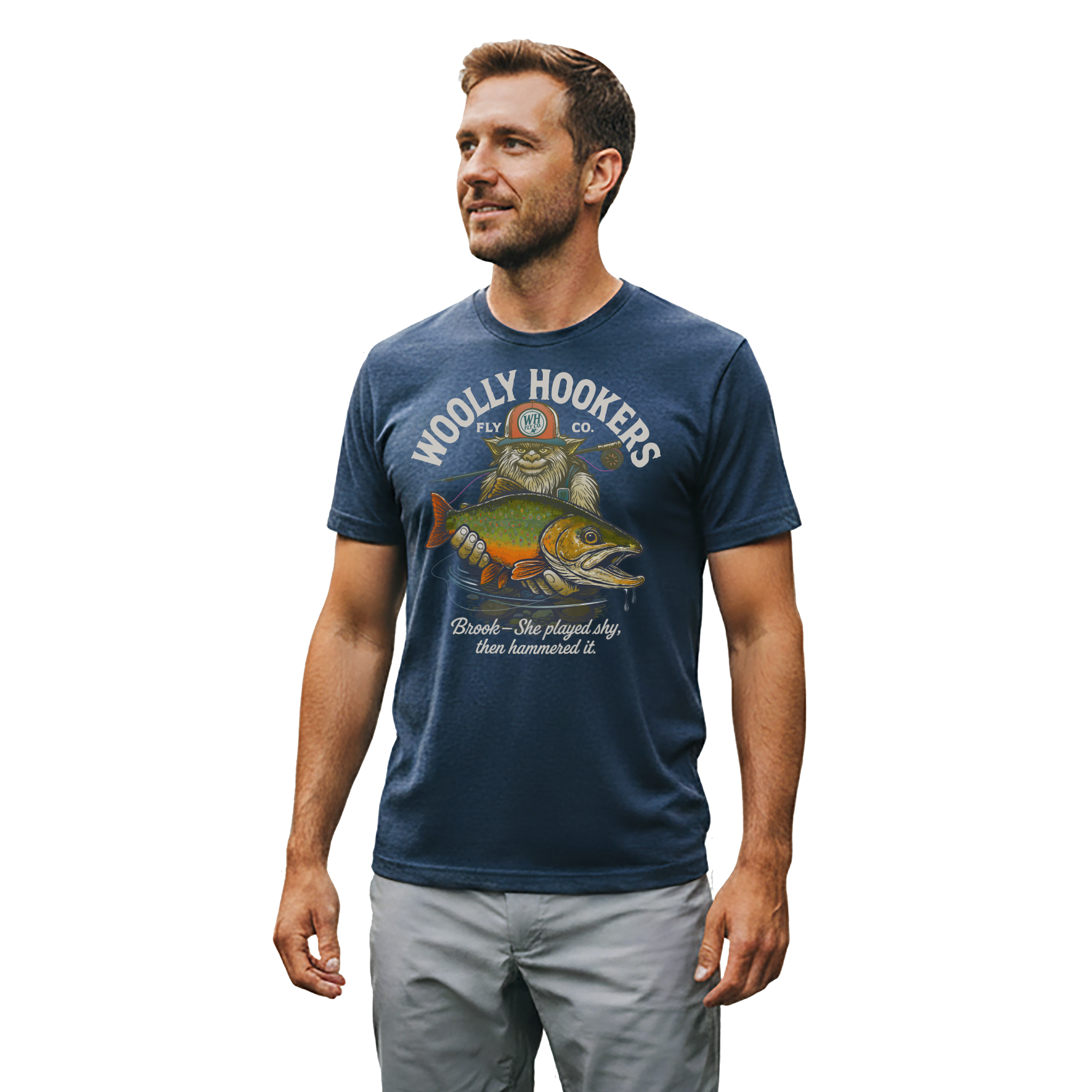 Man fly fishing wearing Woolly Hookers “Brook Played Shy” tee on the river at sunset.
